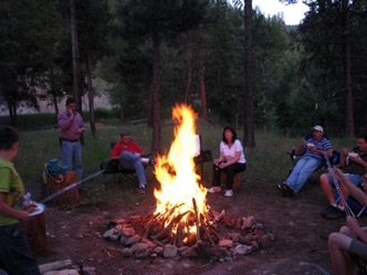 Guests around campfire